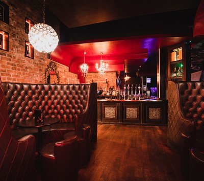 Photograph of a living room in a log cabin Pubs, Cafés & Restaurants