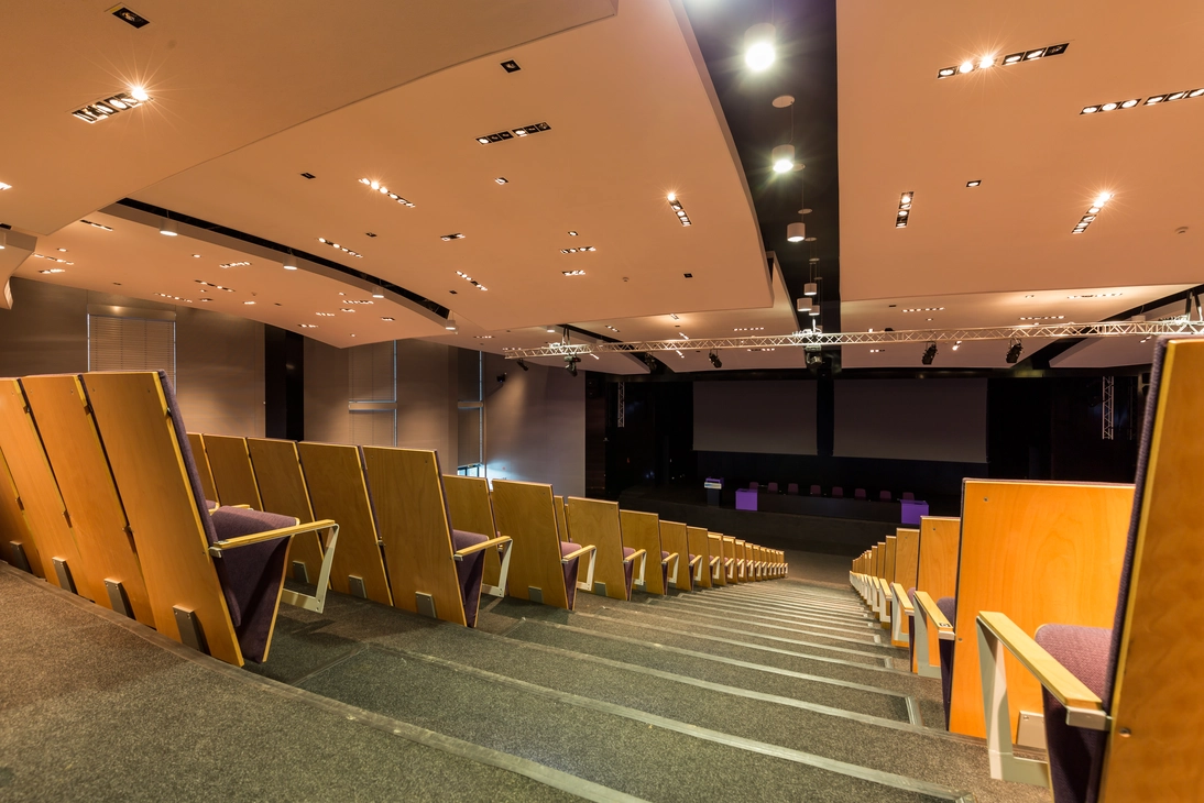 Photograph of a living room in a log cabin Cinemas & Theatres